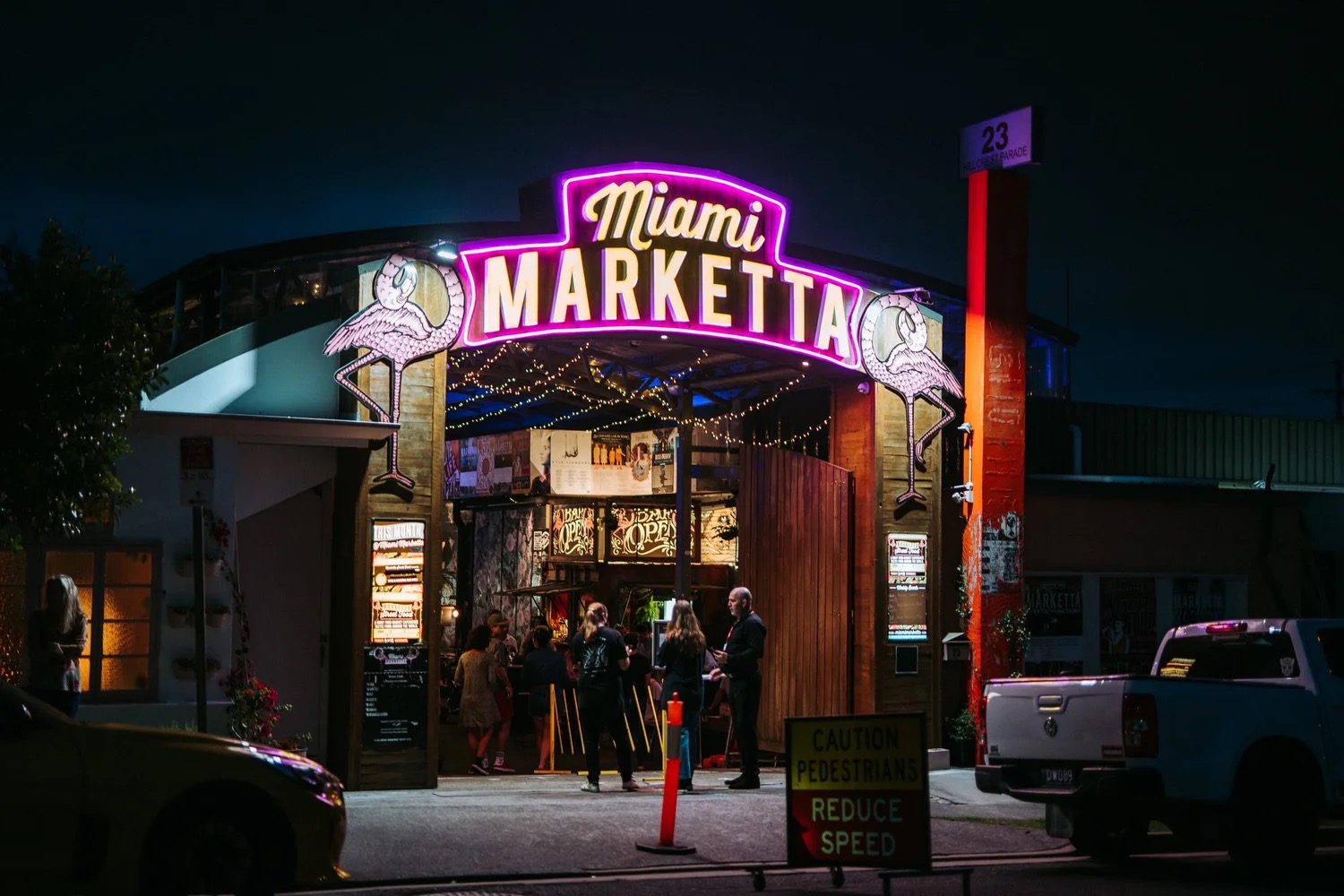rainy-day-elanora-indoor-run Neon-lit undercover entrance to Miami Marketta street-food night market on the Gold Coast